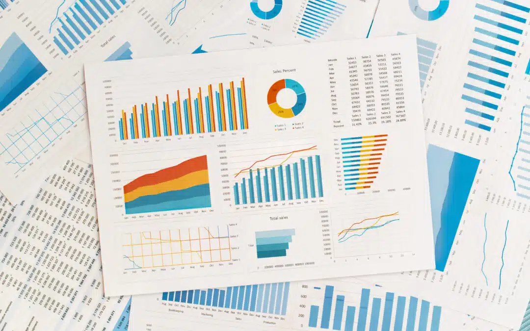 a pile of papers showing graphs